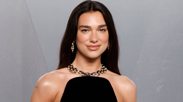 Dua Lipa’s Multicolor French Manicure Says Summer Isn’t Over Yet—See the Photos